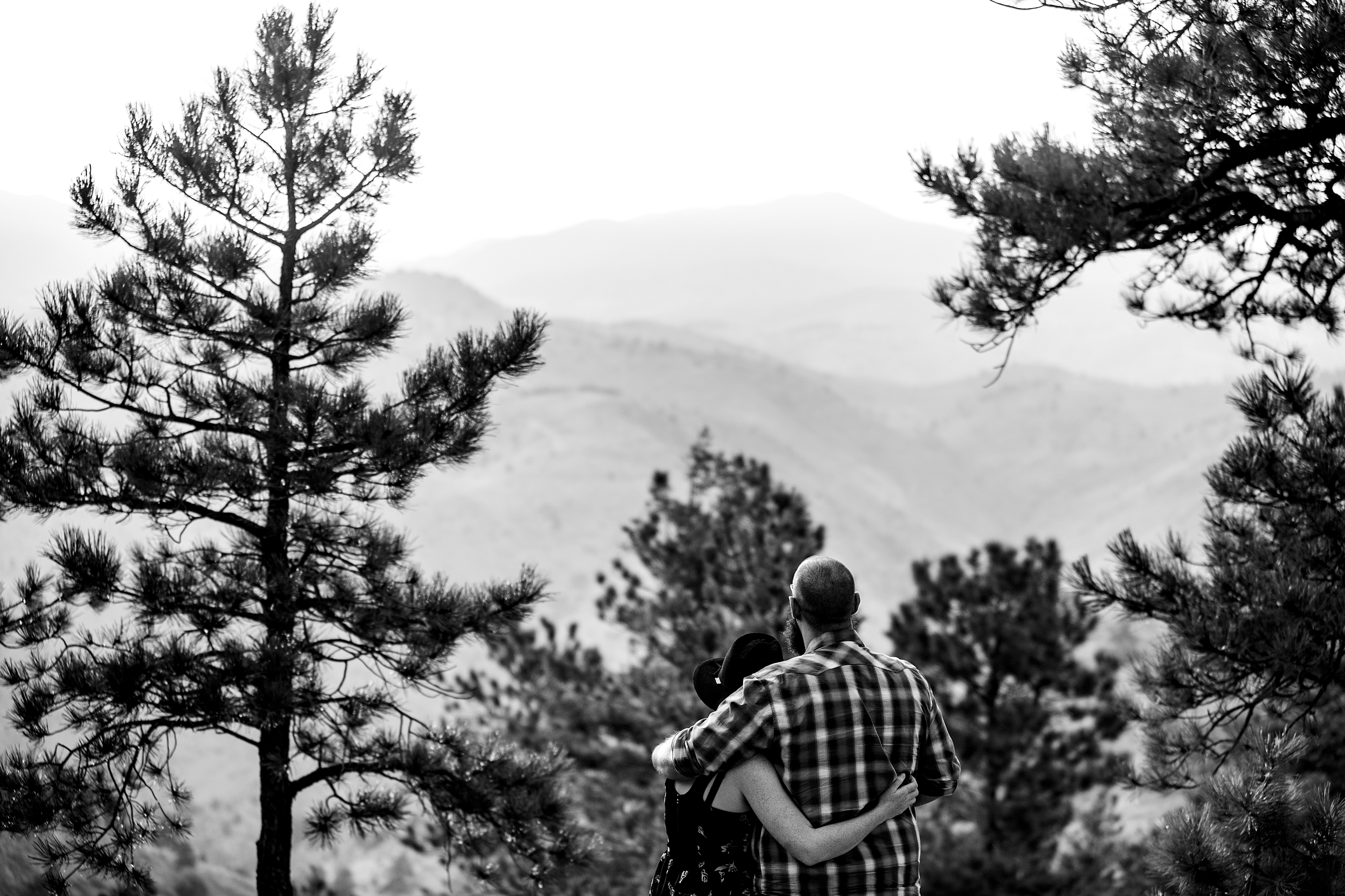 couple looks over the mountains blog post about mental health